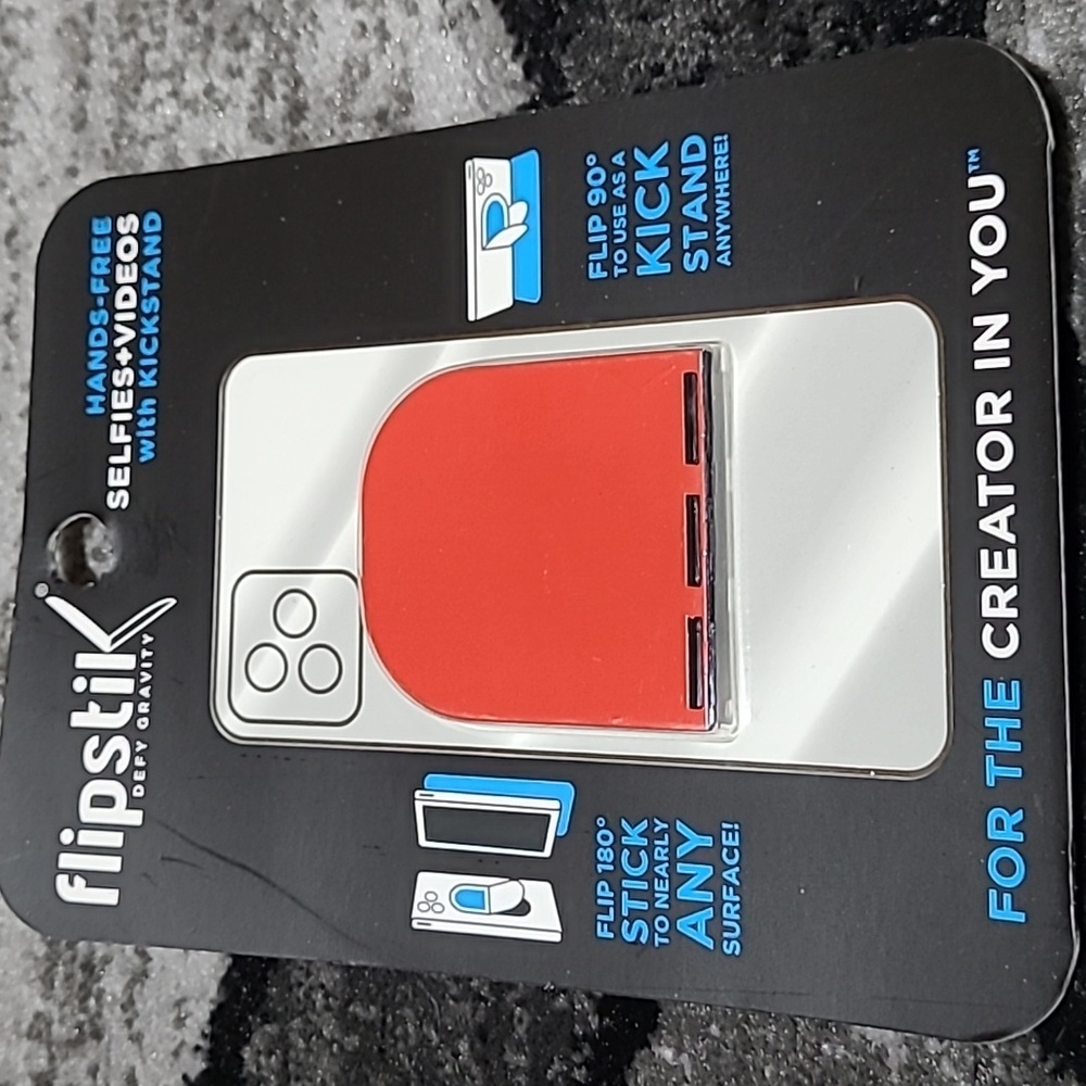 FLIPSTIK DEFY GRAVITY CELL PHONE RED STICK & KICK STAND PRICE FIRM